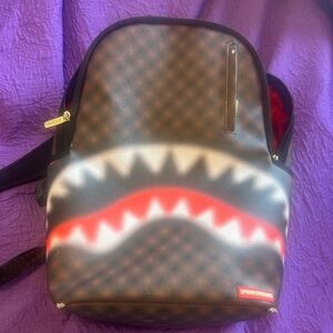 Sprayground Black and Red Shark Backpack